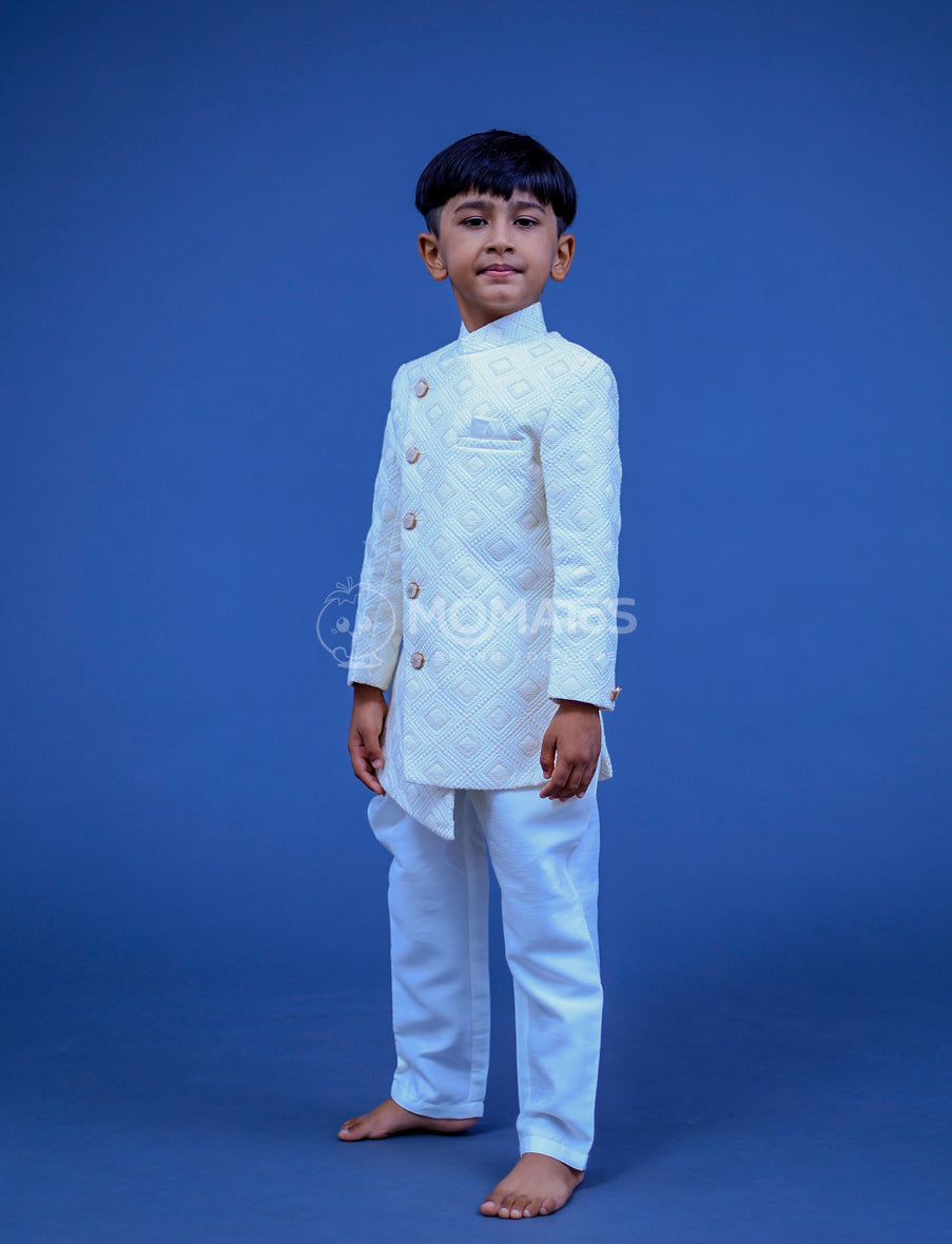 Discover elegance with our Cream Sherwani for boys